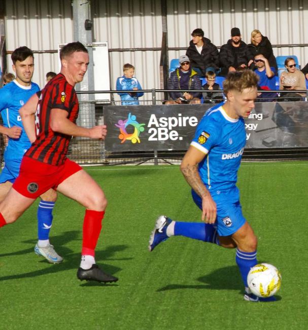 Haverfordwest County skipper Corey Shephard drives forward from midfield. Picture Gordon Thomas Haverfordwest County skipper Corey Shephard drives forward from midfield. Picture Gordon Thomas